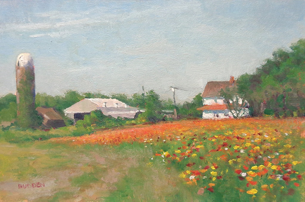 Painting of a flower farm showing a field or flowers in the foreground and a farmhouse, barns, and silo in the background by Michael Budden. Sold by Maser Galleries.