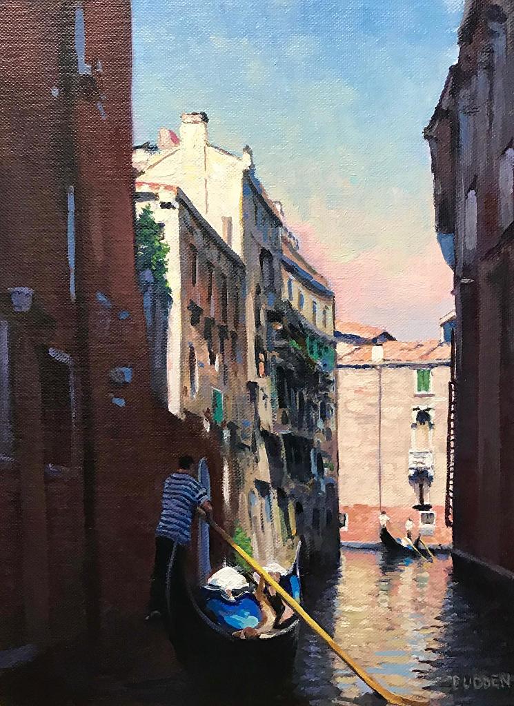 Painting of a gondolier guiding a gondola in a canal between buildings in Venice, Italy by Michael Budden. Sold by Maser Galleries.