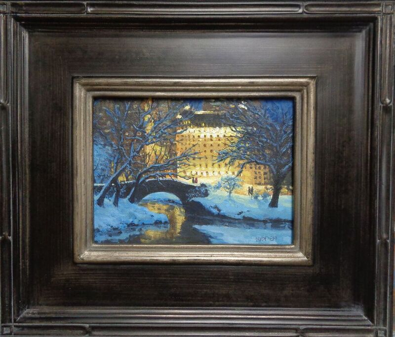 Painting in a brown and gold frame of the Gapstow Bridge in Central Park in New York City on a snowy evening by Michael Budden. Sold by Maser Galleries.